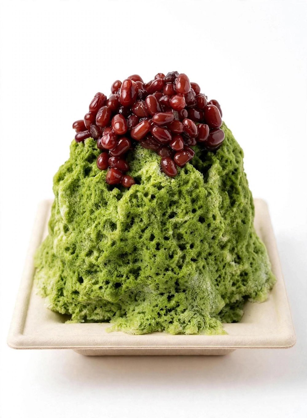 Matcha shave ice topped with azuki red beans